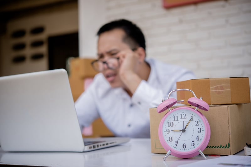 young-man-working-marketing-online-with-laptop-box-post